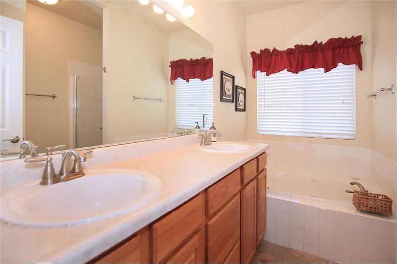 5-piece master bath with kitchen height counters and jetted tub.
