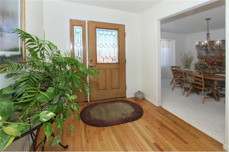 Entry with hardwood floors