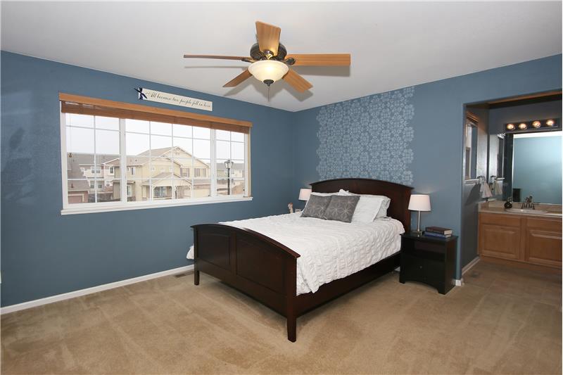 Master bedroom with an adjoining full bath