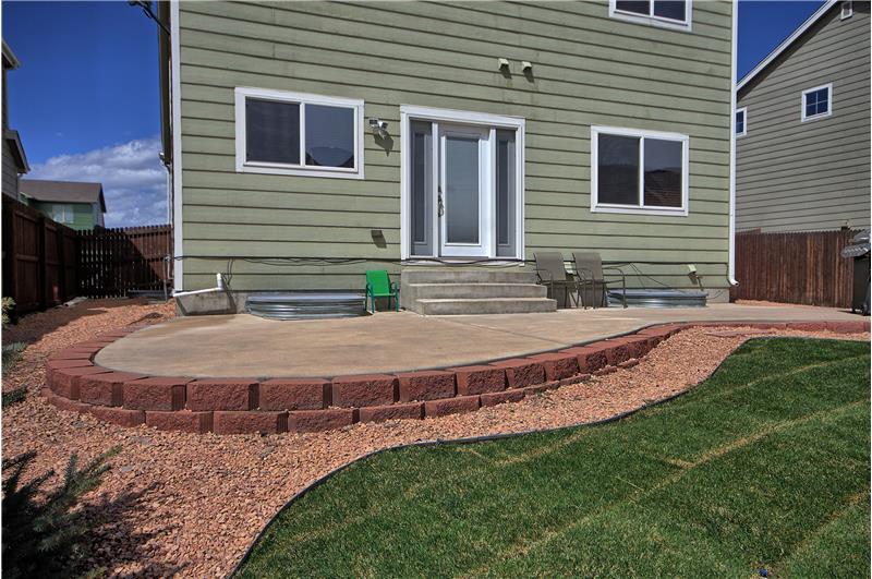 One of two patios in the backyard