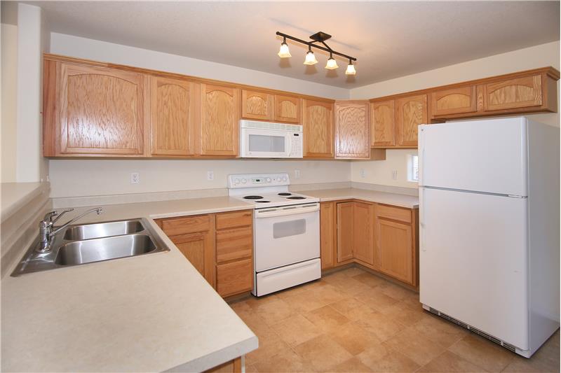 Large kitchen with plenty of cabinet storage and counter top space