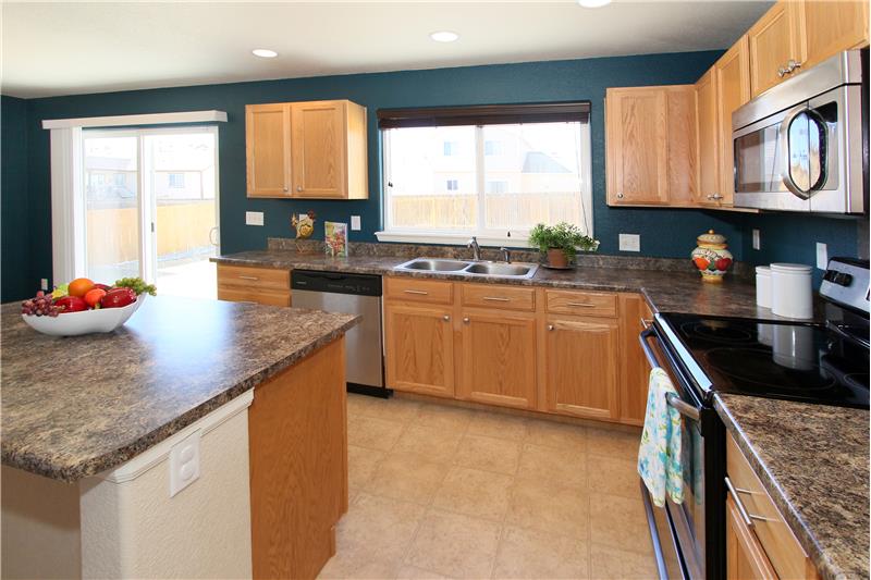 Ample cabinet storage and counter top space