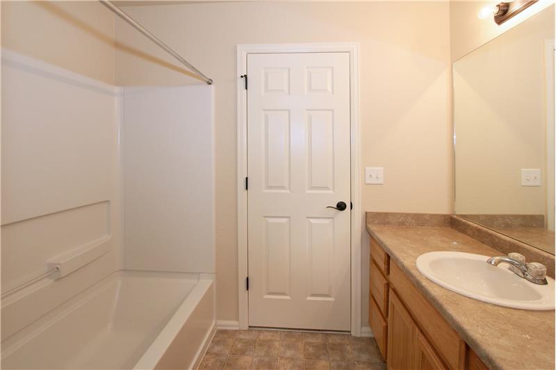 Full bath on upper level with linen closet