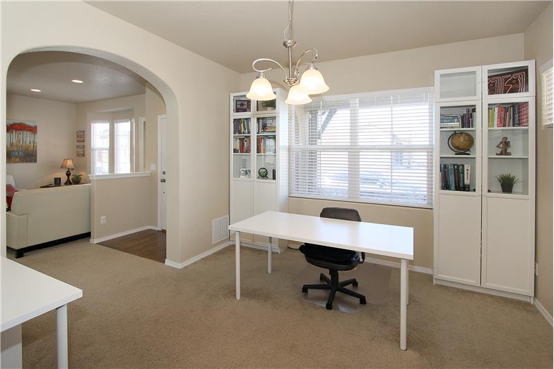 This room may be used as a formal dining room or office