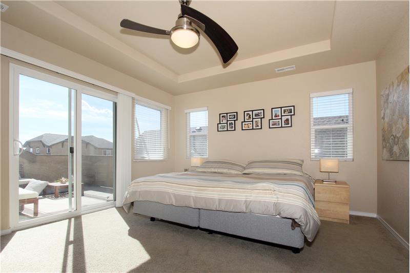 Sizable master bedroom is very bright!