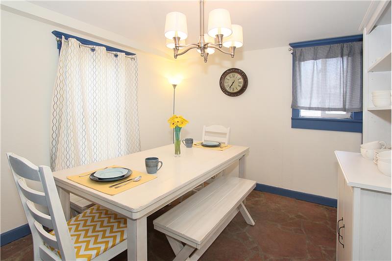 Dining room with natural stone flooring