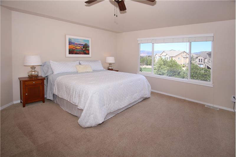 Large master bedroom with stunning views of Pikes Peak!