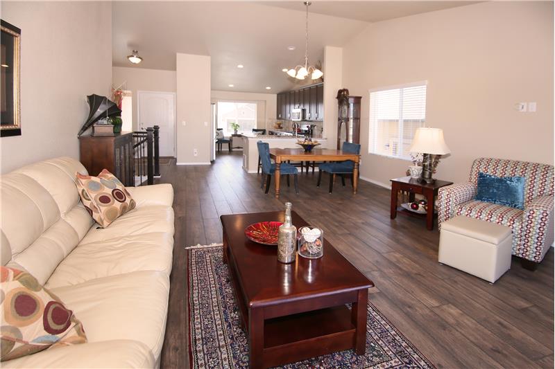 Vaulted ceilings and wood laminate flooring on the main level! So open and bright!