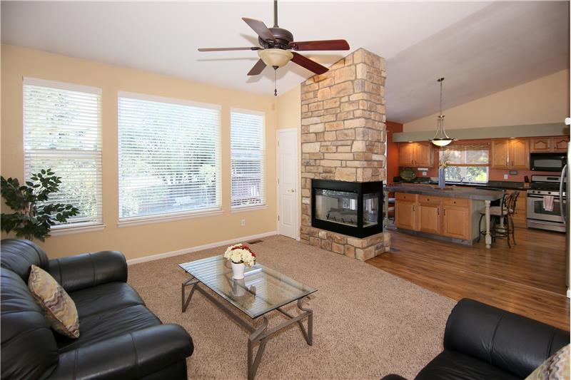 View of family room and kitchen, this home has a great flow!