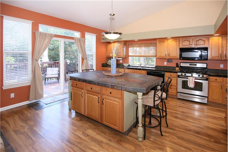 Open kitchen with large island is great for entertaining!