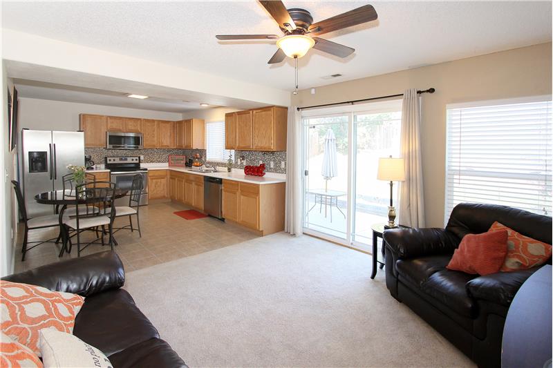 View of family room and kitchen
