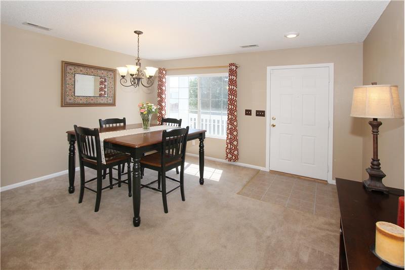 Formal living room is currently being used as a formal dining room