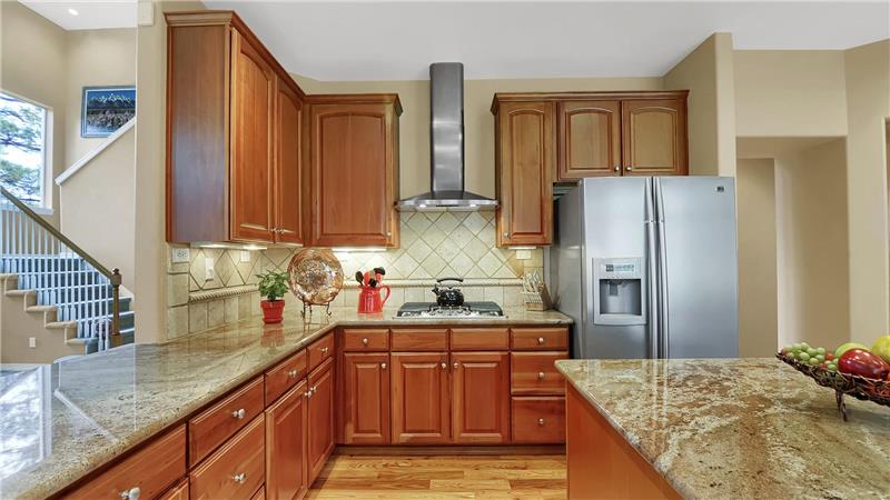 5-burner gas range and stainless steel appliances