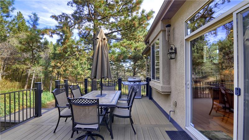 Enjoy nature and the quiet backyard from the composite deck