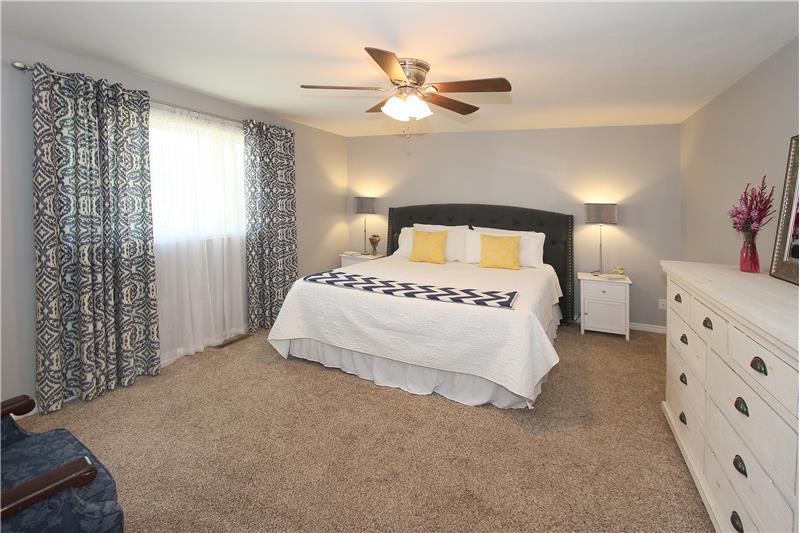 Master bedroom with ceiling fan