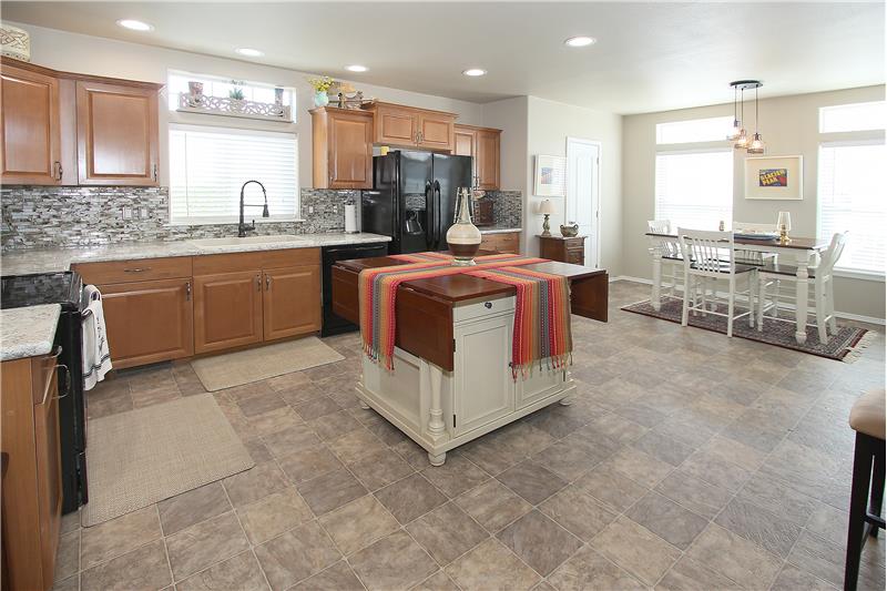 All kitchen appliances and island are included! Single Basin sink, upgraded faucet, and upgraded disposal.