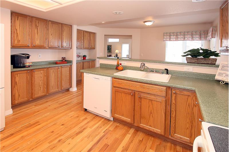 Hardwood flooring and perfect spot for a coffee bar