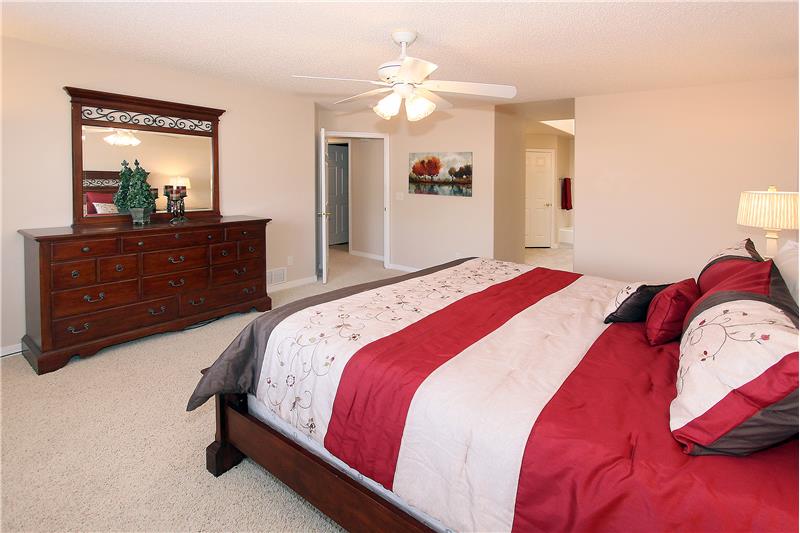 Master bedroom with adjoining 5-piece bath and His and Hers closets