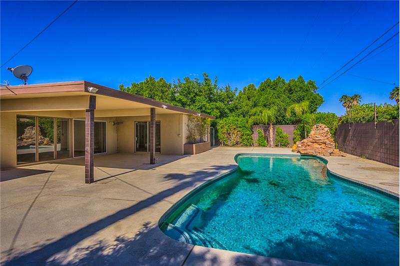 Private Backyard with Pool and Waterfall