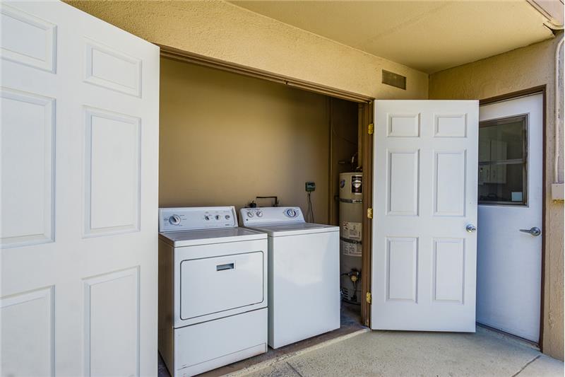 Washer and Drier off of Kitchen