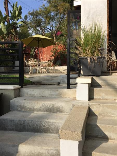 Stairs from patio and House to driveway level