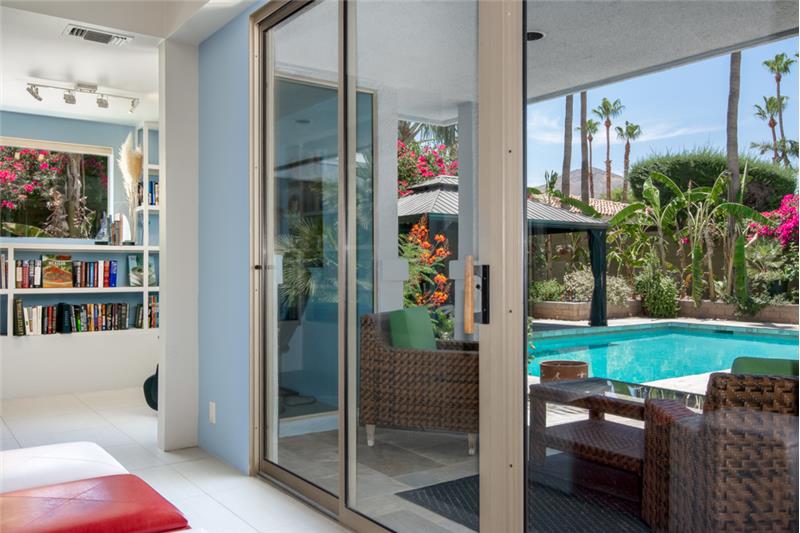 Living area and Library looking toward pool