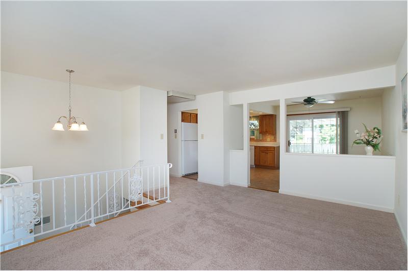 Living room looking kitchen/dining room