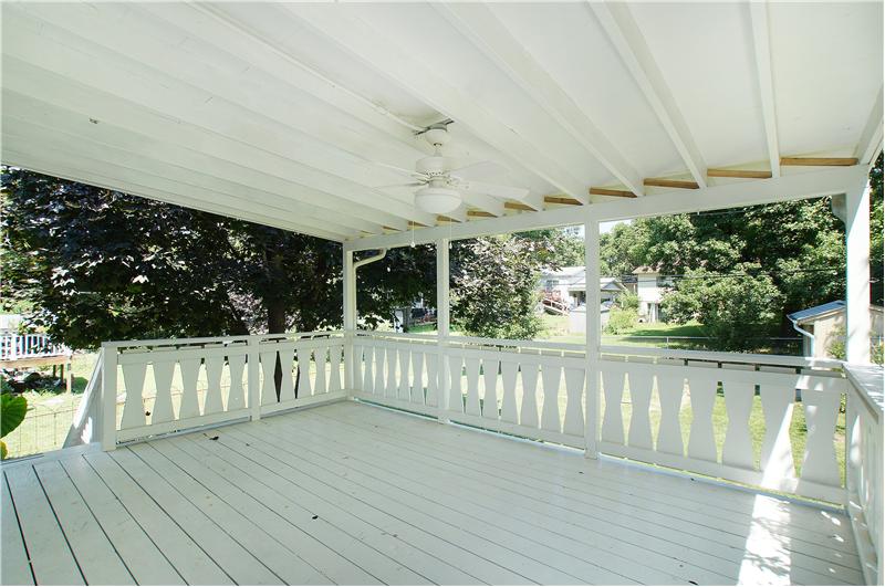 Covered porch off dining area