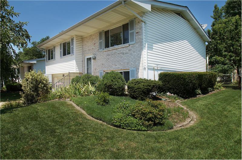 Front with view of landscaping
