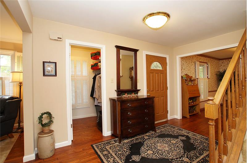 Entry foyer with walk in coat closet