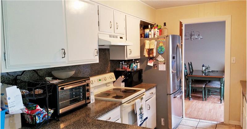 Range - Dishwasher - Refrigerator Included