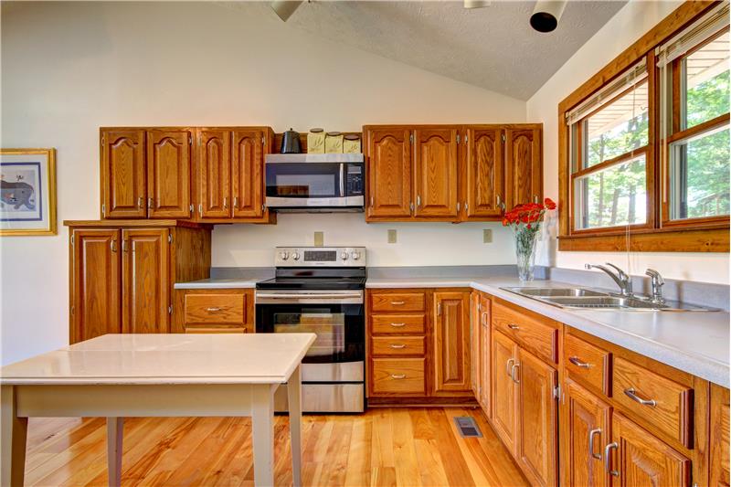 Kitchen + Island at 283 Walleye Rd, Falls of Rough