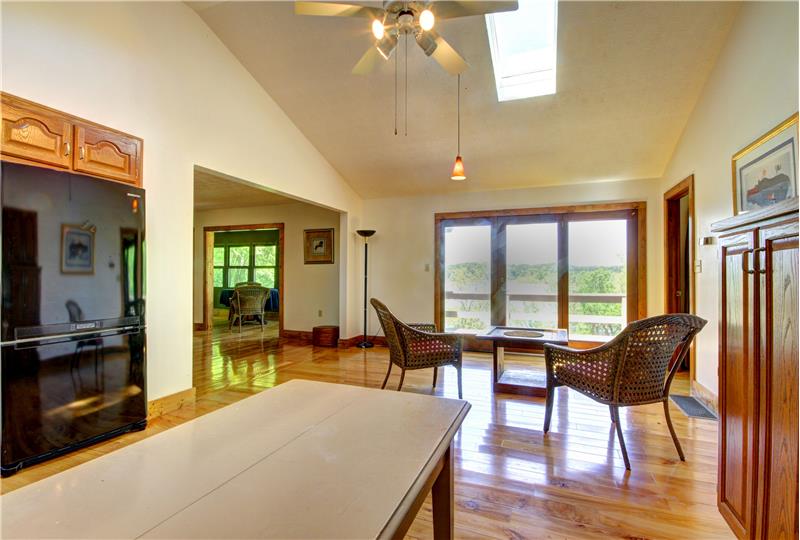 Kitchen and dining area with View to River at 283 Walleye Rd, Falls of Rough