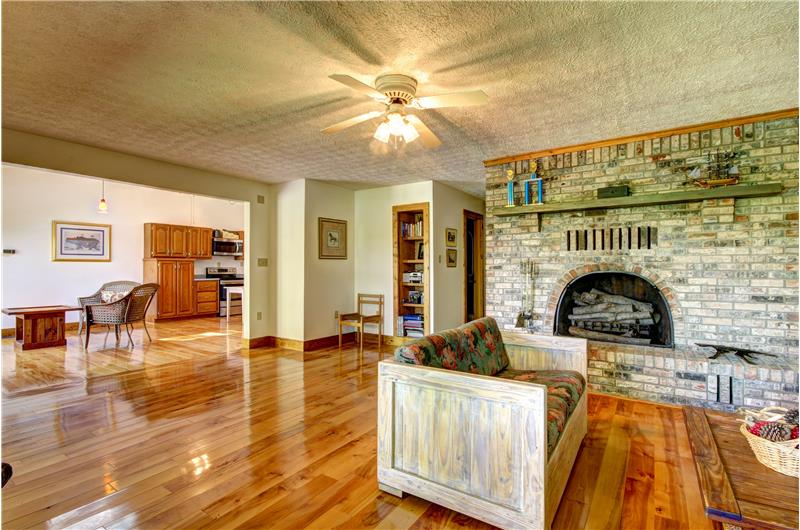 Living Room and Kitchen. Beachwood Floors throughout at 283 Walleye Rd, Falls of Rough