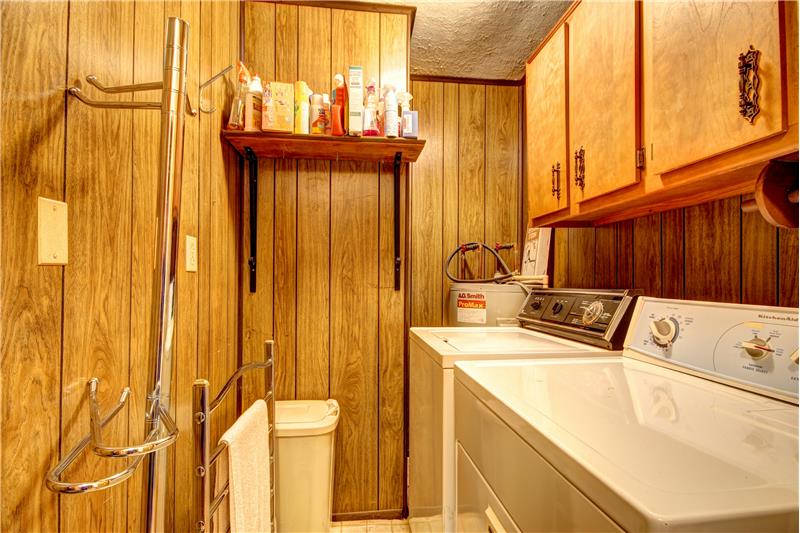 Deep Laundry Room with cabinets at 283 Walleye Rd, Falls of Rough