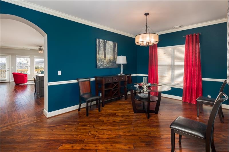 Dining Room includes Crown Molding, Chair Rail and double Windows