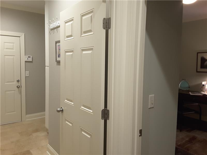 Entry to Mud Room on left, entry to Study/Bedroom 4 on right