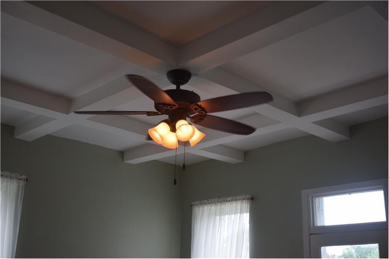 New ceiling fans and coffered ceilings throughout.