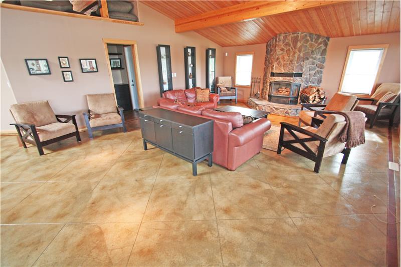 The main floor is wide open with vaulted ceilings.