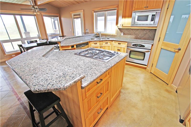 Granite counters and stainless steel appliances.