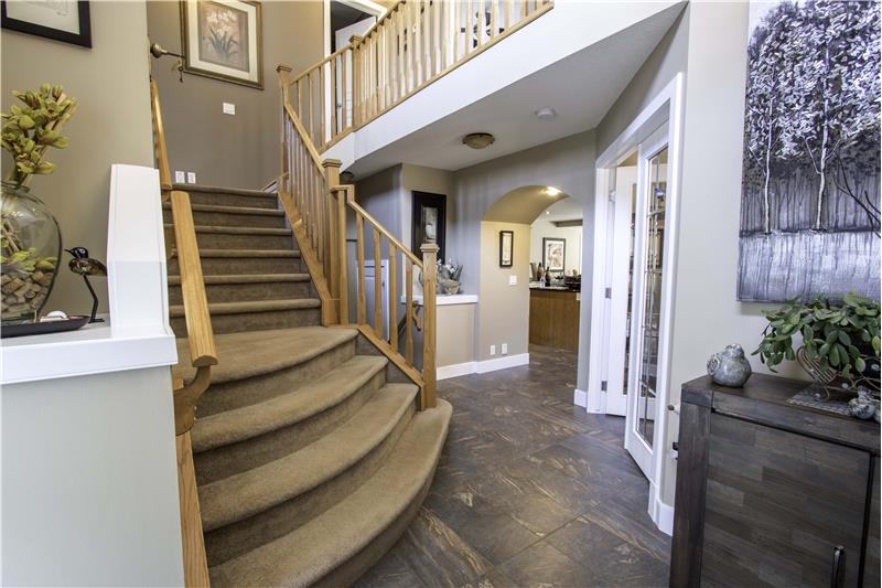 Staircase & corridor to laundry, bath & garage.