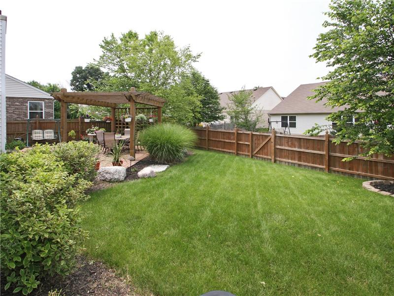 Beautiful fenced in back yard.