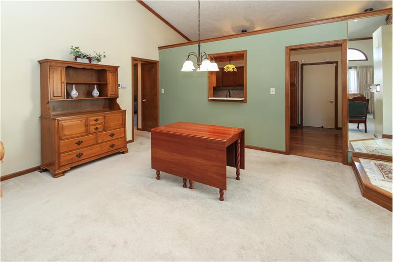 8055 Foxchase Dr, - Dining room with opening to the kitchen.