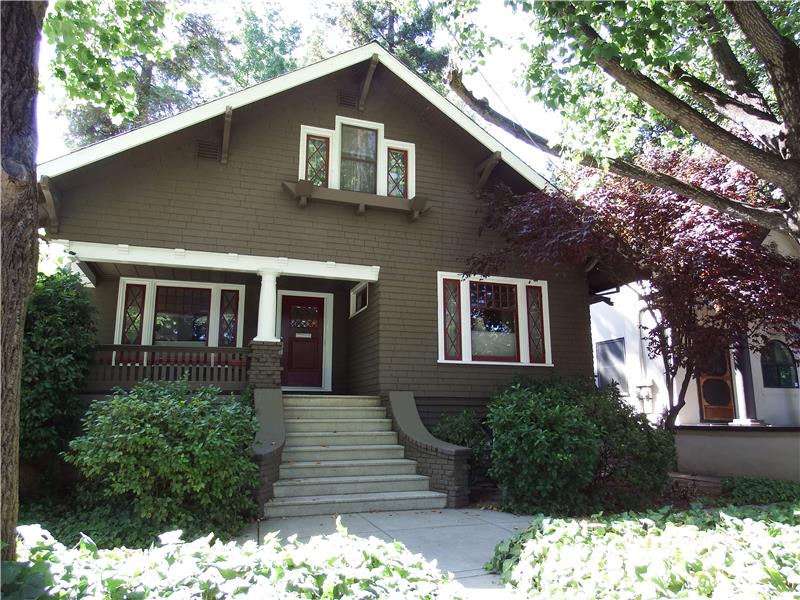 This charming historic 1911 Arts and Crafts Style Bungalow sits in the desirable Midtown Sacramento Marshall School Neighborhood