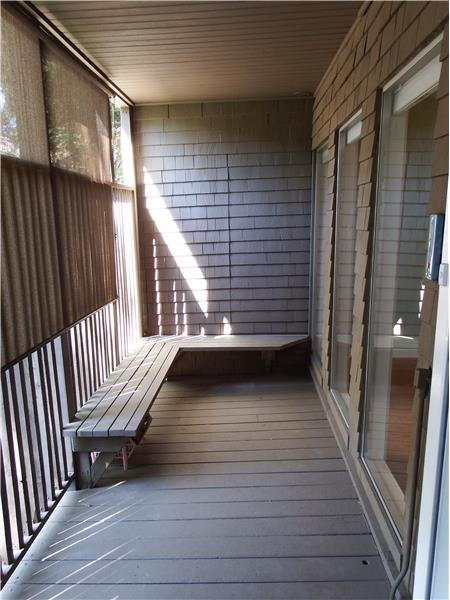 As you step outside the dining room you will see a small enclosed patio. This is big enough for you to setup a bar-b-cue and hav