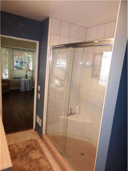 A large tiled shower serves the down stairs bedrooms.