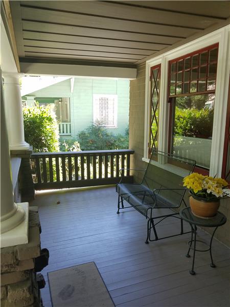Relax on the spacious porch and watch the world go by. The home is within walking distance to grocery stores, restaurants, coffe
