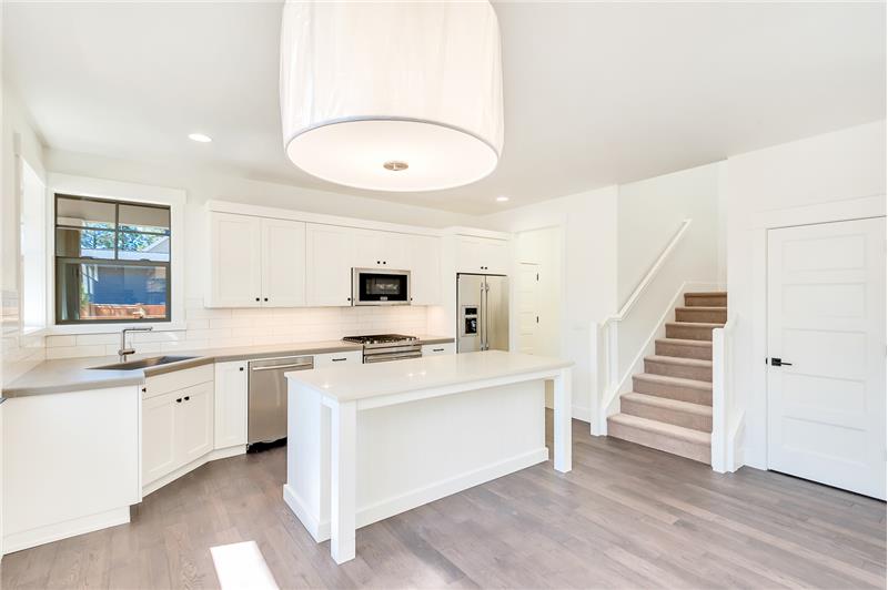 Photo shown is not of subject property.  Photo is of a completed unit with a similar finishes but different floor plan. 