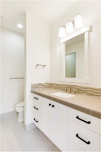 Photo shown is not of subject property.  Photo is of a completed unit with a similar finishes but different floor plan. 
