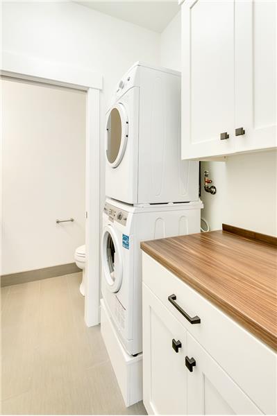 Photo shown is not of subject property.  Photo is of a completed unit with a similar finishes but different floor plan. 